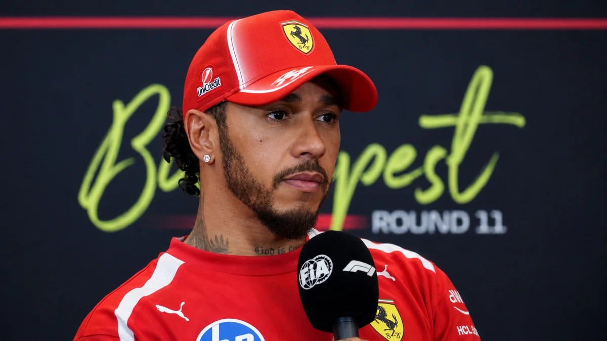 Lewis Hamilton speaking to the media in Ferrari colours at the Hungarian Grand Prix in Budapest