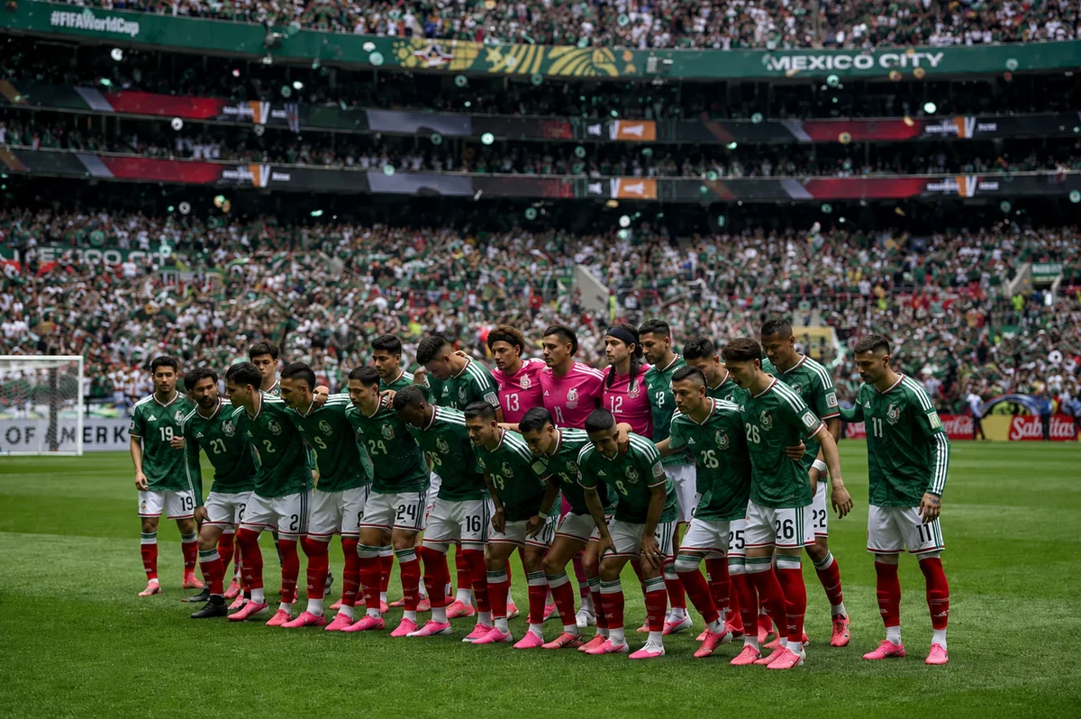 The Mexico national team lined up at the Estadio Azteca, almost every player wearing bright pink boots