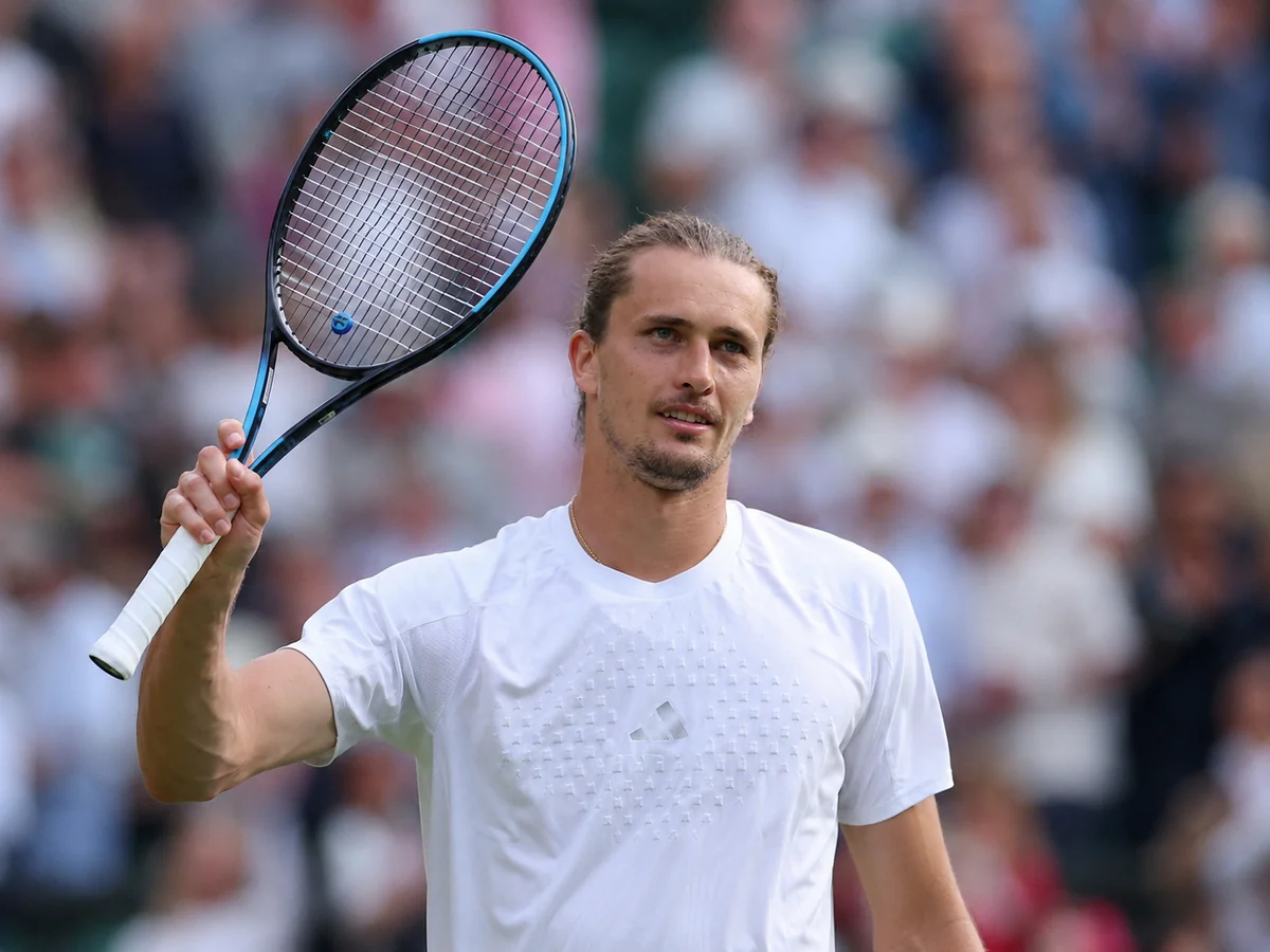 Alexander Zverev acknowledges the crowd after a Wimbledon win